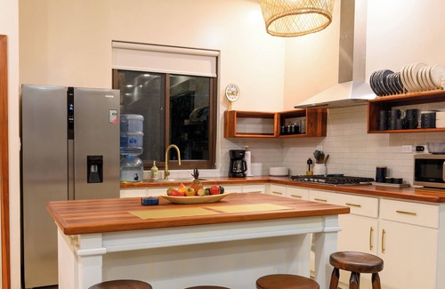 Santa Ana Villa | Villa Feliz: Rustic charm meets modern luxury in a 3BR villa with private pool.