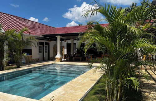 Santa Ana Villa | Villa Feliz: Rustic charm meets modern luxury in a 3BR villa with private pool.
