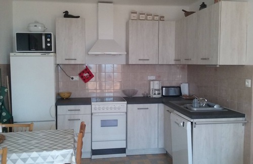 Embrun Apartment | Villa ground floor apartment with sunny terrace & garden, mountain view