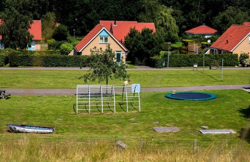 Andijk House | Villa in Friesland with Jetty and Garden