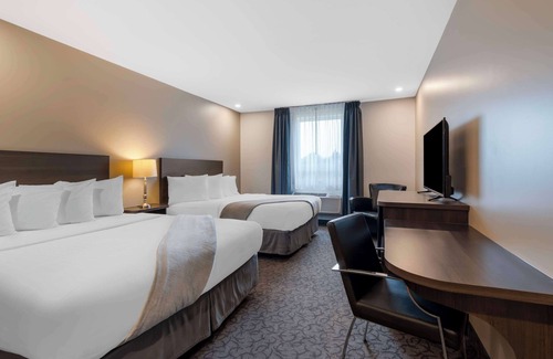 Hearst Hotel | Villa Inn & Suites, SureStay Collection by Best Western
