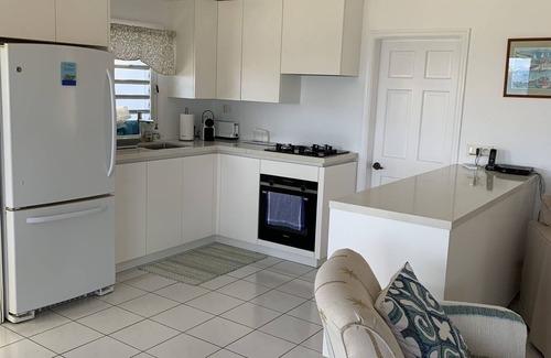 Anse de Lorient Villa | Villa Le Refuge, panoramic ocean views in private setting above Lorient Beach