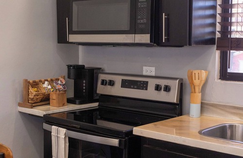 Silver Sands Villa | Villa on the Rock ~ Luxury vacation rental near beach with Roof top lounge area