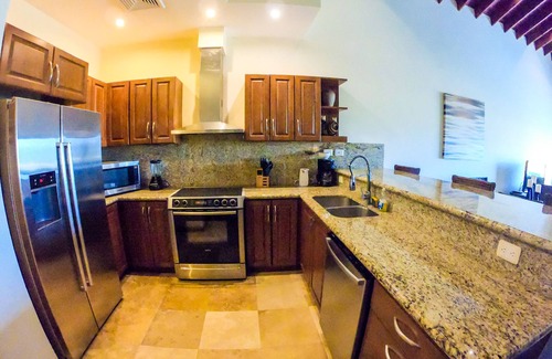 Pristine Bay Villa | Villa Paradiso Sorrunded by Pete Dye Golf Course