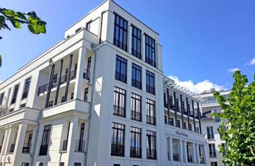 Sellin Villa | Villa Philine - Penthouse 28 mit Panoramablick, Pool, SPA & Kamin