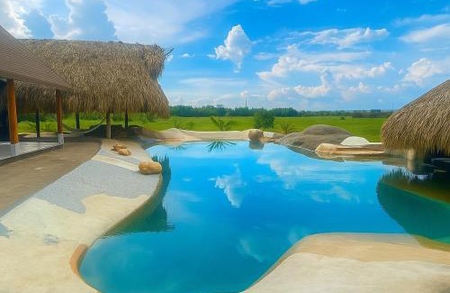 Menegua Villa | Villa Sara Villavicencio - Puerto López Alameda del llano