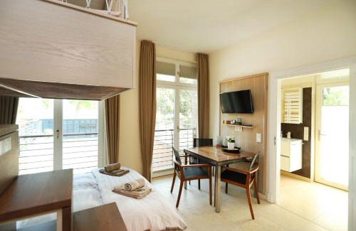 Hohe Dune Apartment | Villa Schmidt Apartments - Strandhaus direkt am Meer mit Sauna, Sport und Dünengarten III