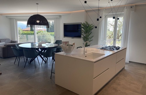 Gardone Riviera Villa | Villa surrounded by greenery with splendid lake view.