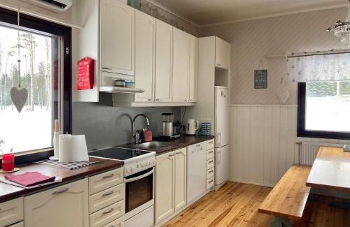 Pertunmaa Ski Chalet | Villa Taikinajoki, LaatuLomat
