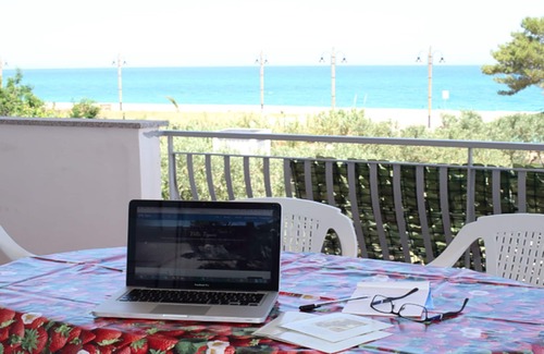 Marina di Davoli Apartment | Villa Tigani: direct beach access breathtaking seafront view Nausicaa apartment