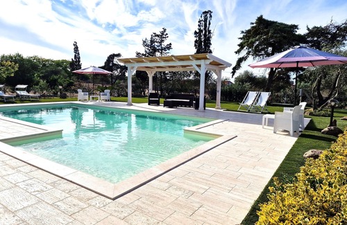 Sorso Villa | Villa with swimming pool, surrounded by flower gardens, near the sea.