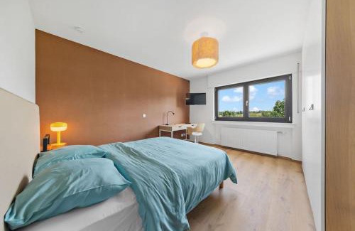 Roeser Apartment | Villa66 Private bedroom 3 - Shared Kitchen