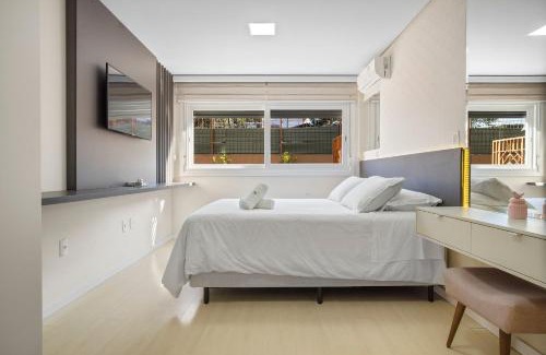 Centro Apartment | Villagio Del Venetto com ampla varanda by Achei