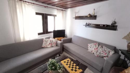 Tzermiado House | VillaTzer - Traditional house with fireplace and garden