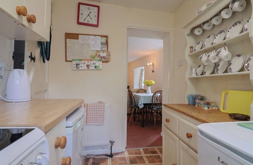 Bridport Cottage | VINE COTTAGE, pet friendly, with a garden in Burton Bradstock