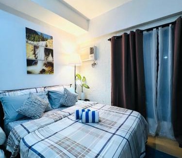 Phil-Am Apartment | Vinia Infinity Studio 2 Near Malls with WiFi Netflix and Karaoke