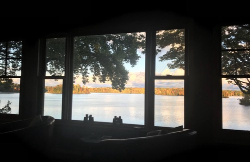 Traverse City House | Vintage Artsy Lake Cottage with Island Views