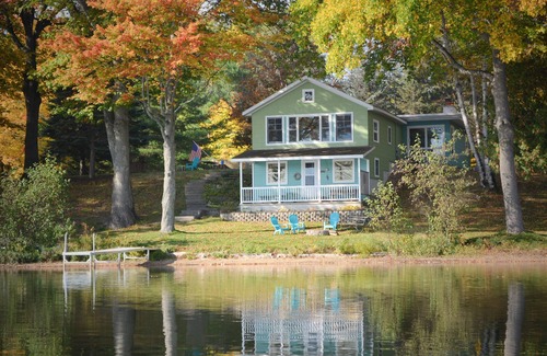 Traverse City House | Vintage Artsy Lake Cottage with Island Views