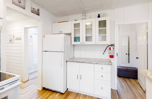 Crystal Beach Cottage | Vintage cottage with private yard, firepit, grill, renovated interior, & W/D