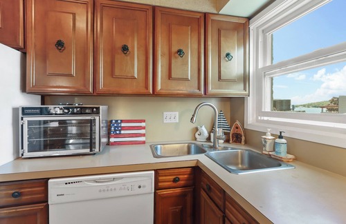 Lake Geneva Condo | Vintage FUN 2-bedroom condo in the heart of Lake Geneva's downtown area!