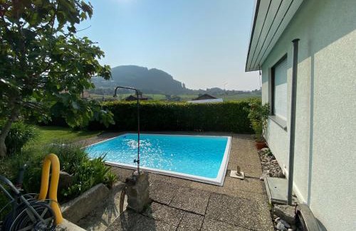 Faulensee House | Vintage Lake View Villa with Outdoor Pool
