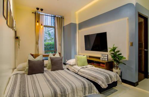 Pinagsama Apartment | Vintage Mickey Disney Stay in BGC -200mbps wifi