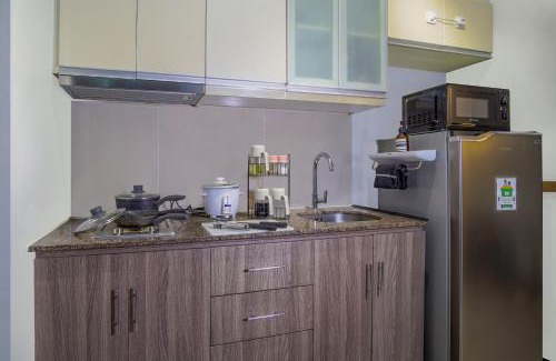 Pinagsama Apartment | Vintage Mickey Disney Stay in BGC -200mbps wifi