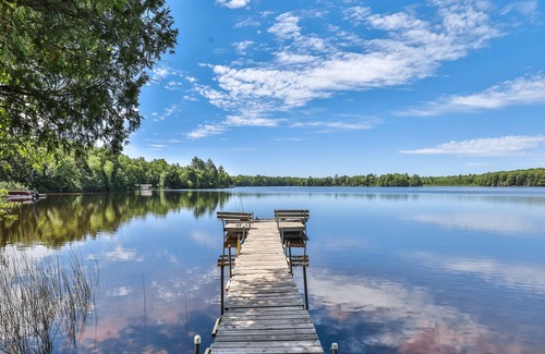Presque Isle House | Vintage waterfront suite on South Turtle Lake with on-site dock & rowboats