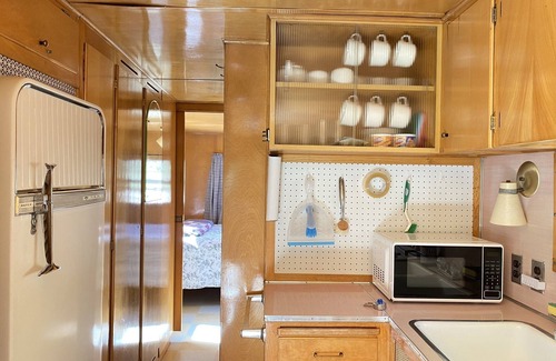 Kernville House | Vintage wood paneled travel trailer on Kernville Ranch with horses and hot tub