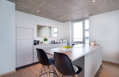 Kappeln Apartment | Vision: Luxurious apartment with wood-burning stove, Finnish sauna and Baltic Sea view