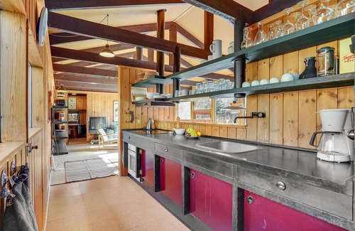 Rrvig House | Visit this charming wooden house surrounded by wonderful nature.
