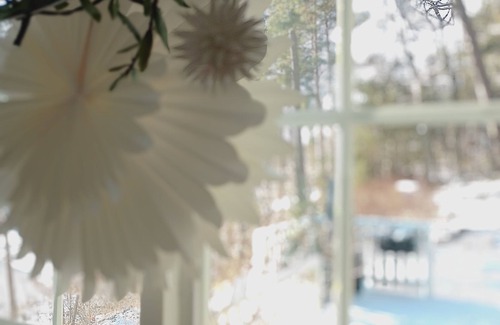 Bromma House | Vita Huset with a view of Lake Mälaren in Södra Ängby
