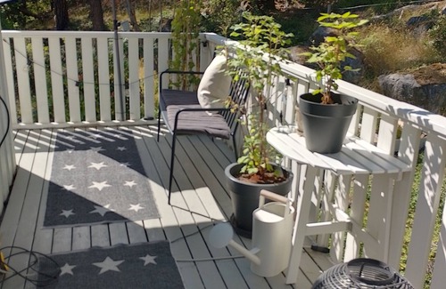 Bromma House | Vita Huset with a view of Lake Mälaren in Södra Ängby