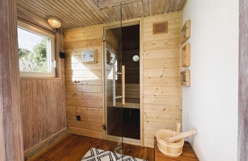 Westerholz House | VITA Sonnholm - modernisiertes Häuschen mit Garten am Meer