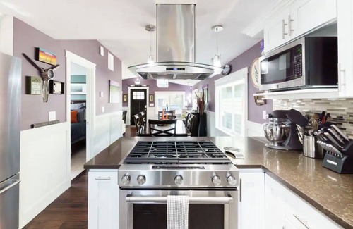 Brighton House | Vivid colorful craftsman with patio and fire pit