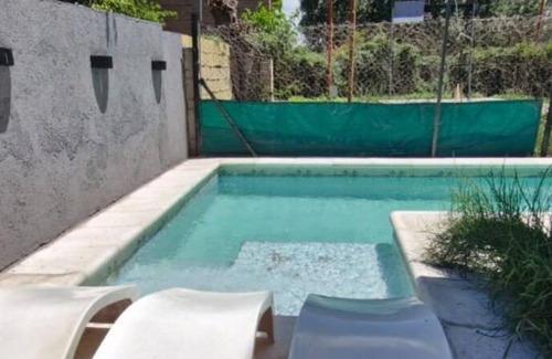 Villa Carlos Paz House | Vivisierras, House downtown Villa Carlos Paz, heated swimming pool, 3 bathrooms, barbecue area