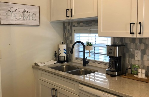 Lower Grand Lagoon Cottage | VO Resort: w/golf cart, beach/bay access, boat dock, fish pier, mini golf & more