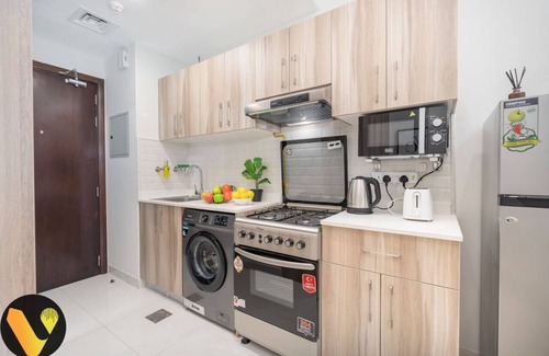 Dubai Sports City Apartment | Vogue Studio at Hera Tower Sports City