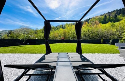 Traisen House | Voralpen Lodge - Ferienhaus mit Gym & Wellnessbereich