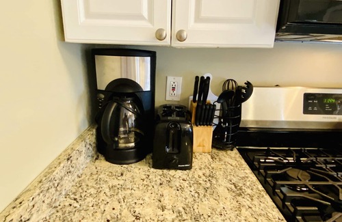 Seaside Heights House | VRBO PREMIER HOST LISTING - 2 BR BEACH SUITE - TWO POOLS. Full Kit & Liv Rm