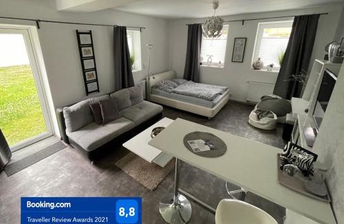 Bueckeburg Apartment | W1 - Kontaktloser 24h CHECK IN, W-LAN, Netflix, Parkplatz, Küche, Boxspring-Bett