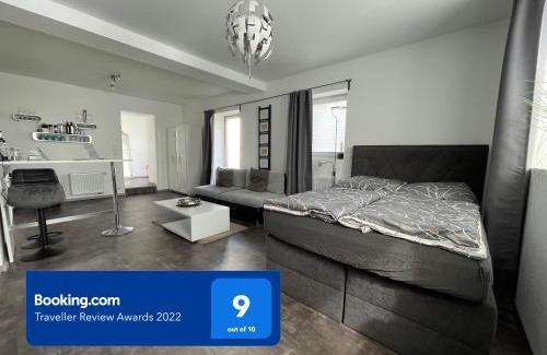 Bueckeburg Apartment | W1 - Kontaktloser 24h CHECK IN, W-LAN, Netflix, Parkplatz, Küche, Boxspring-Bett