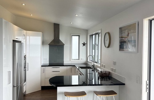Waipu Cove House | Waipu Cove Beach Bach, stunning ocean views and 5 mins walk to the beach