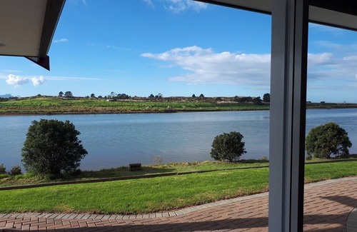Waipu House | Waipu RiverView Retreat for the beach, cafes, golf, surf, hikes, steps to water