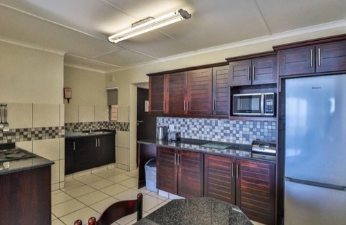 Illovo Beach Apartment | Wake up to the tranquil sight and sound of waves crashing against the shore.