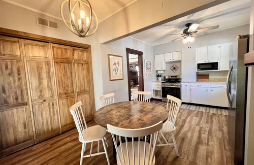Salina House | Walk downtown, Charming 3 BR -2 King beds, Porch, Fire Pit, Theatre, Fenced Yard