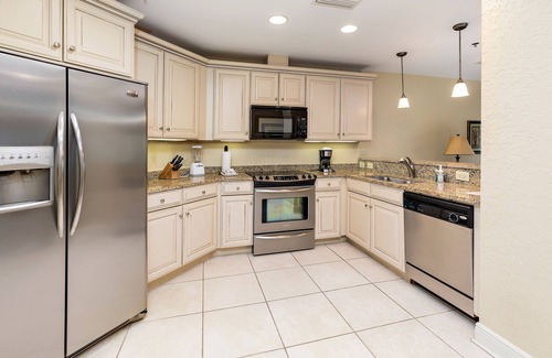 Demere Park Condo | Walk or Bike to Pier and Village from Salt Air Villas! Community Pool and Private Balcony