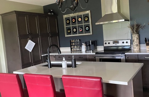 Alberta Apartment | Walk out basement suite at the base of Tecumseh Mountain on 3 acres.