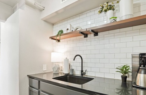 Allandale Apartment | Walk to Restaurants or Cook in Subway Tile Kitchen