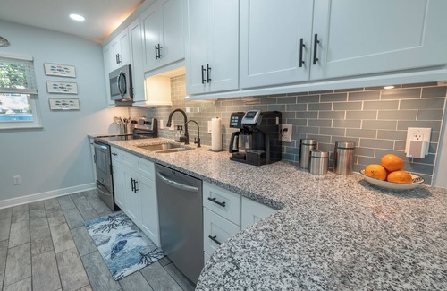Latana Oceanfront Condo | WALK to the BEACH! Hip 2-bedroom/2 bath island condo in Indian Harbour Beach